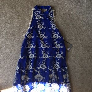 Low back blue dress with flowers